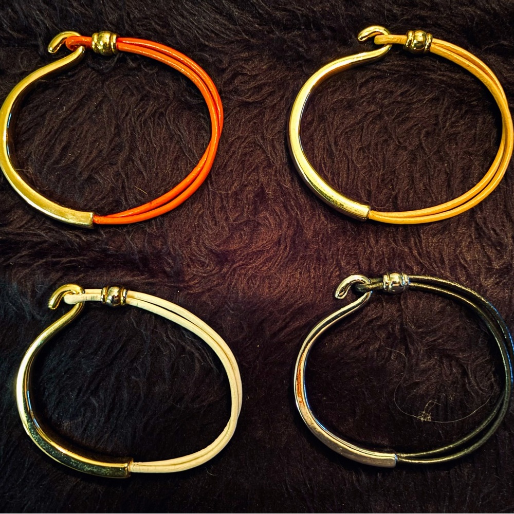 Leather cord and metal bracelets